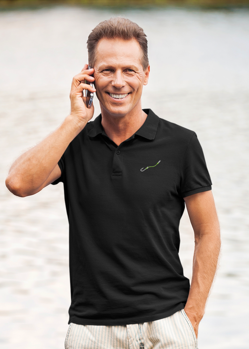Man wearing the Hook & Line ChromaSoft piqué polo — lifestyle photo