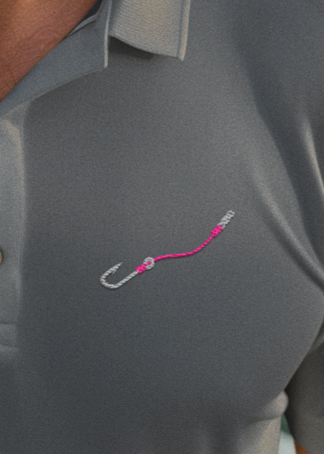 Man wearing the Hook & Line ChromaSoft piqué polo — alternate view